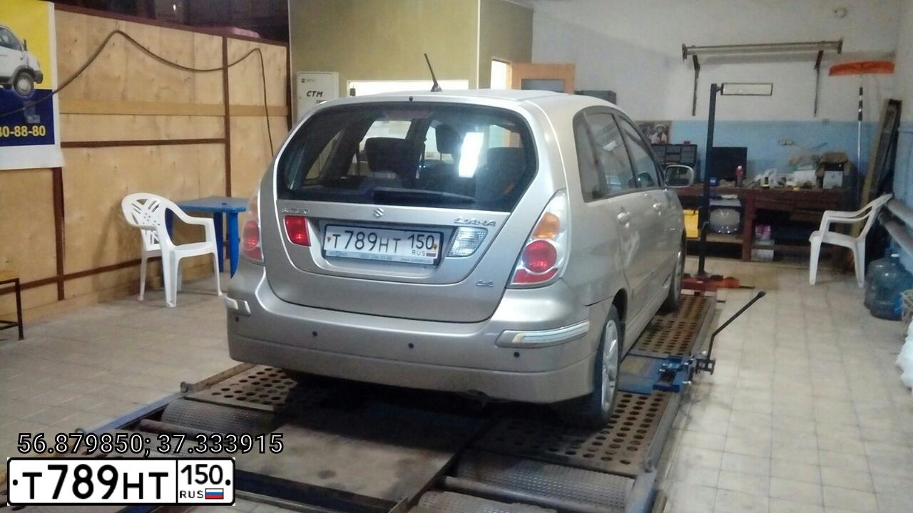 Фото автомобиля SUZUKI LIANA, 2007 — госномер Н562АТ70. Цвет: ПЕРЛАМУТРОВО-БЕЖЕВЫЙ