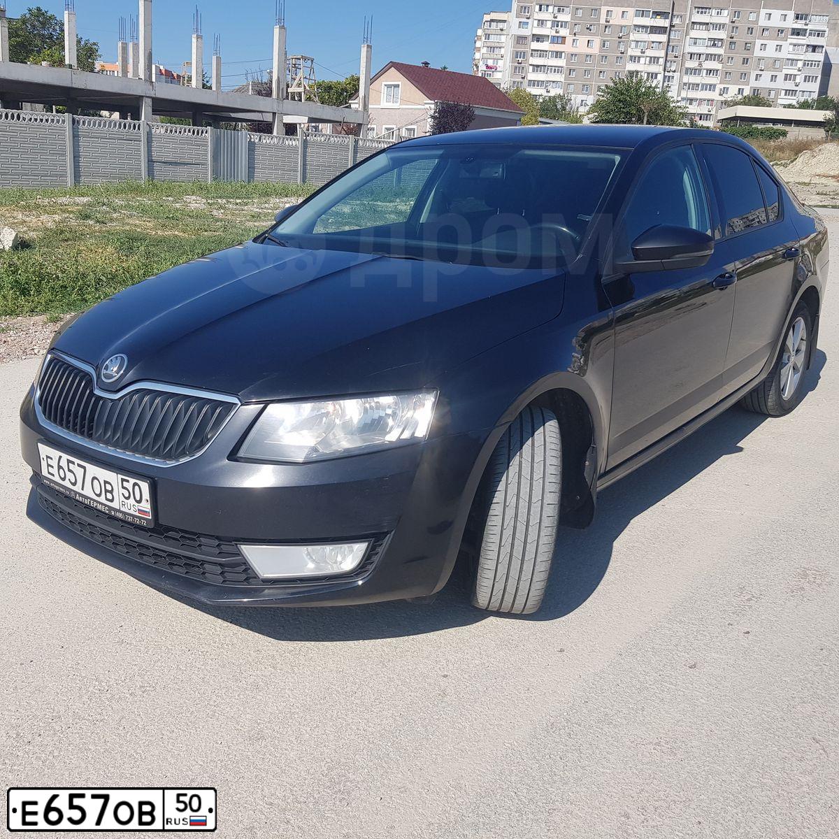 Фото автомобиля SKODA OCTAVIA, 2013 — госномер Е657ОВ50. Цвет: ЧЕРНЫЙ