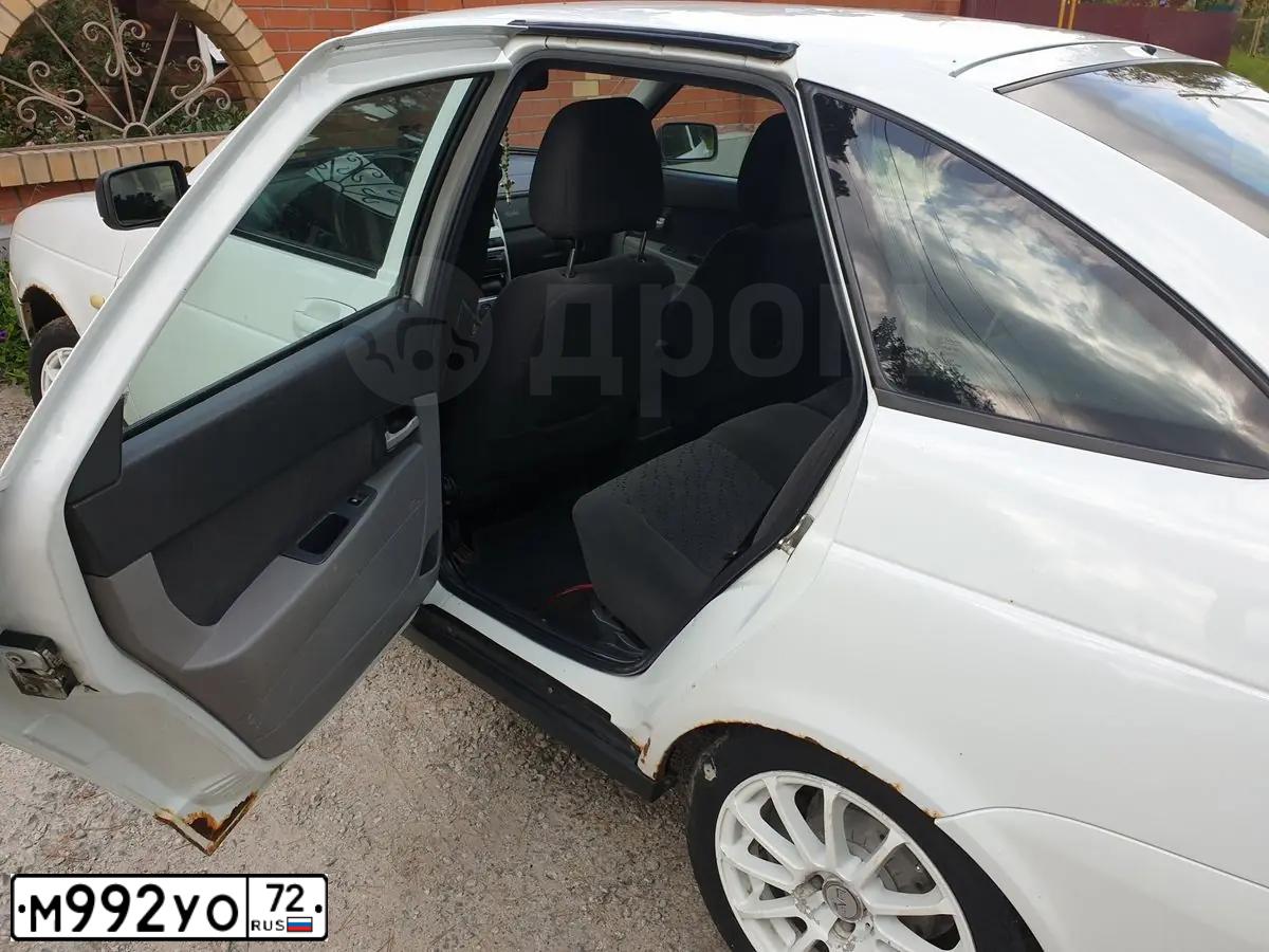 Фото автомобиля LADA 2172 PRIORA, 2010 — госномер М992УО72. Цвет: Белый