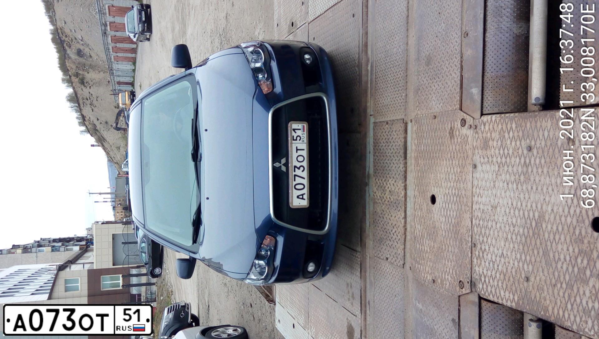 Фото автомобиля MITSUBISHI LANCER, 2011 — госномер А073ОТ51. Цвет: синий