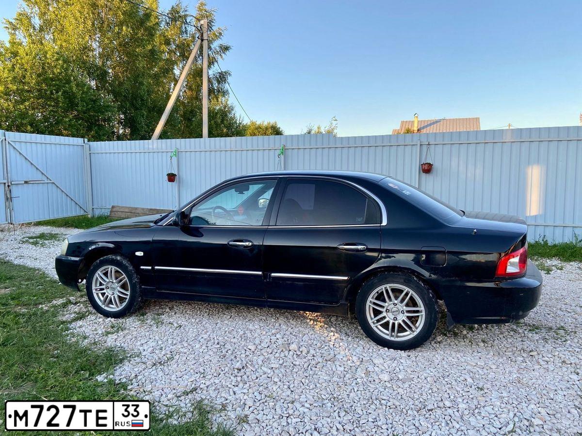 Фото автомобиля KIA MAGENTIS / OPTIMA, 2006 — госномер М727ТЕ33. Цвет: ЧЕРНЫЙ