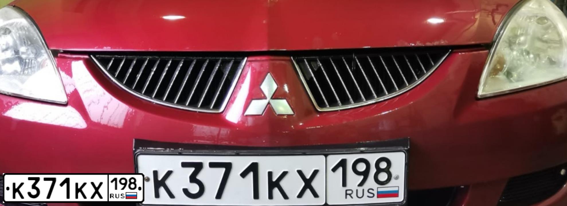 Фото автомобиля MITSUBISHI LANCER, 2004 — госномер К371КХ198. Цвет: Красный