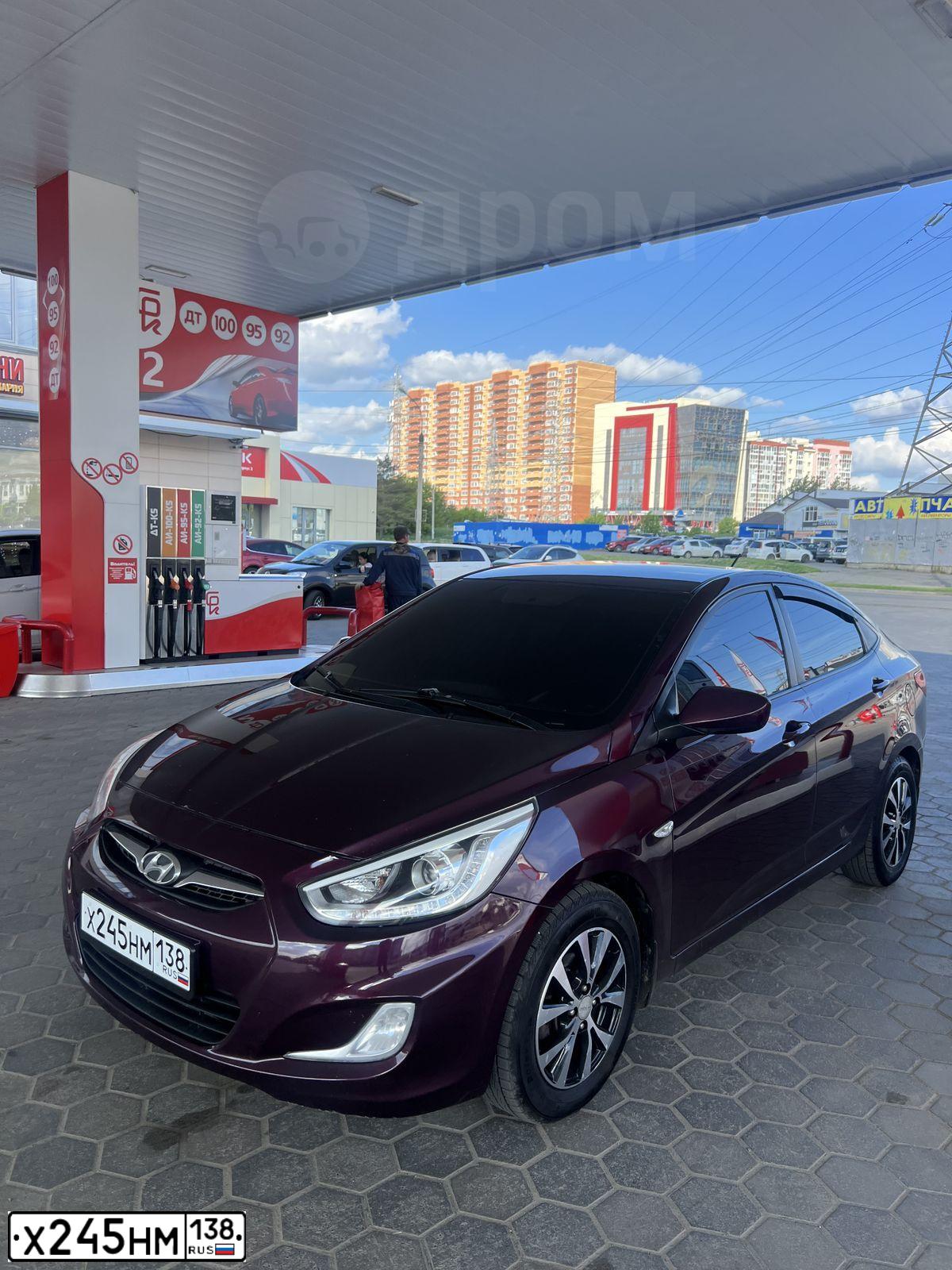 Фото автомобиля HYUNDAI SOLARIS, 2014 — госномер Х245НМ138. Цвет: ФИОЛЕТОВЫЙ