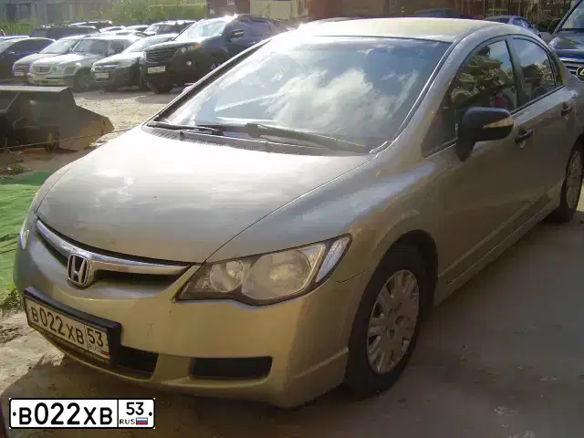 Фото автомобиля HONDA CIVIC, 2008 — госномер В022ХВ53. Цвет: СЕРО-ЗОЛОТИСТЫЙ