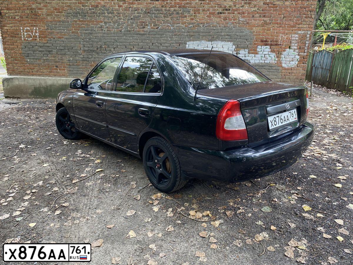 Фото автомобиля TAGAZ ACCENT, 2009 — госномер Х876АА761. Цвет: ЧЕРНЫЙ