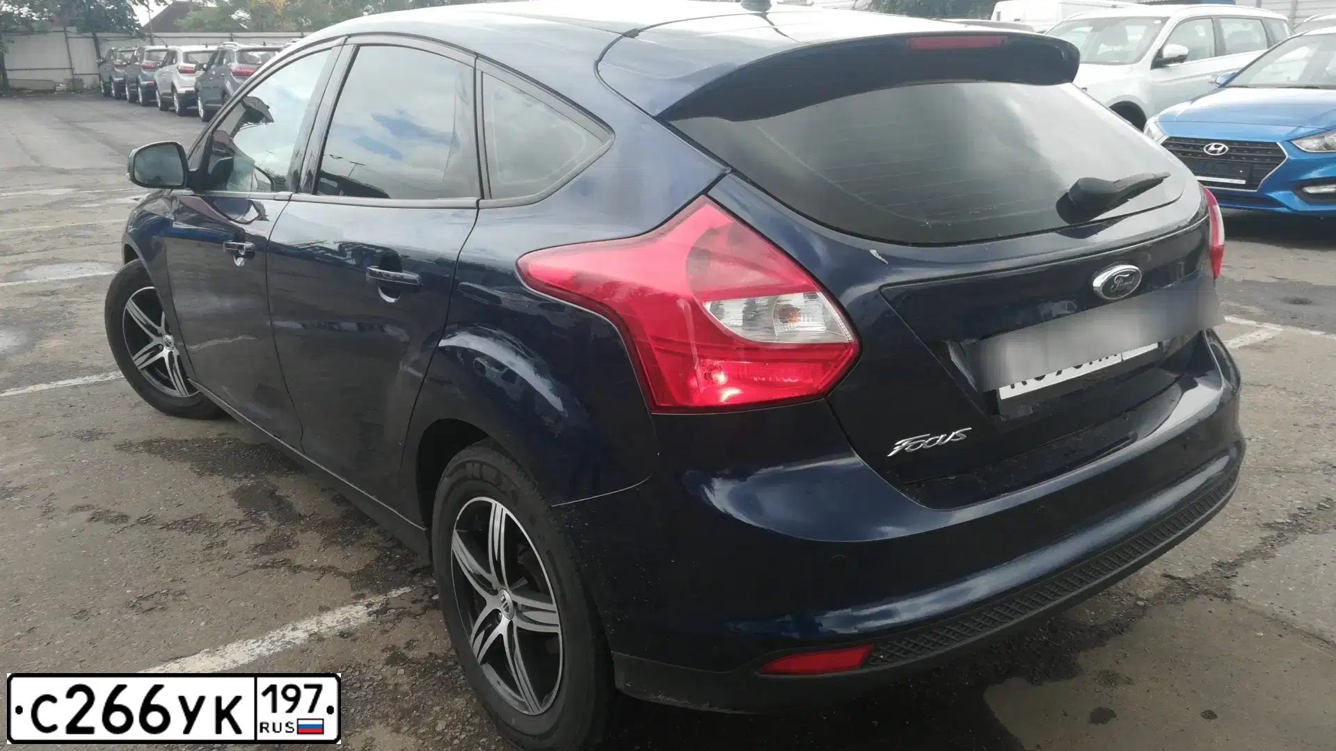 Фото автомобиля FORD FOCUS, 2012 — госномер С131НВ142. Цвет: Темно-синий