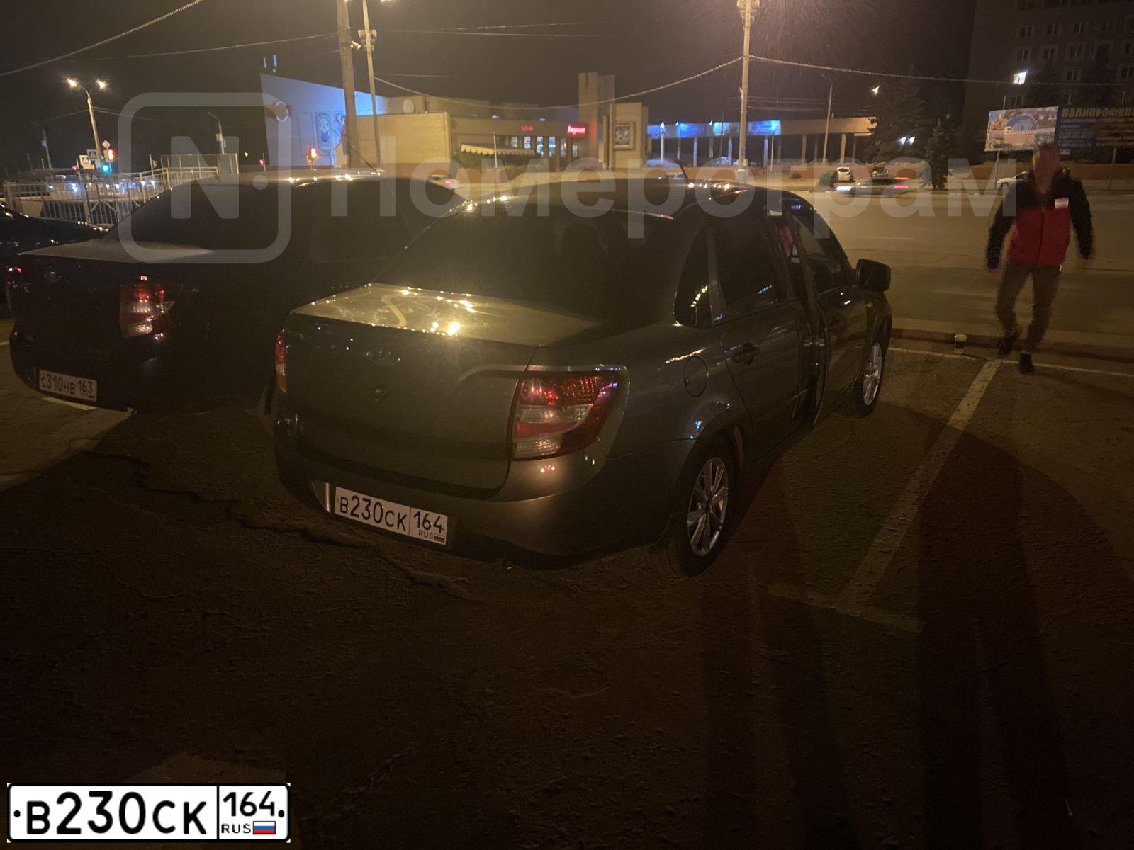 Фото автомобиля LADA 2190 GRANTA, 2014 — госномер В230СК164. Цвет: Золотисто-коричневый