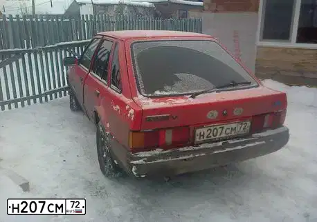 Фото автомобиля FORD ESCORT, 1989 — госномер Н207СМ72. Цвет: КРАСНЫЙ