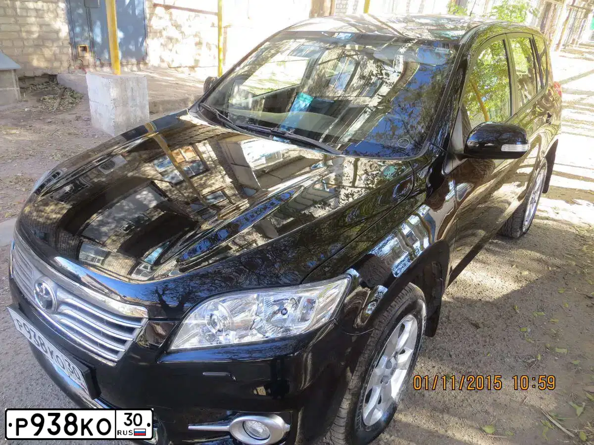 Фото автомобиля TOYOTA RAV4, 2011 — госномер В012ЕО92. Цвет: ЧЕРНЫЙ