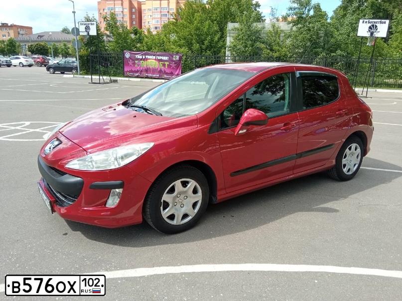 Фото автомобиля PEUGEOT 308, 2010 — госномер Т092СК719. Цвет: Красный