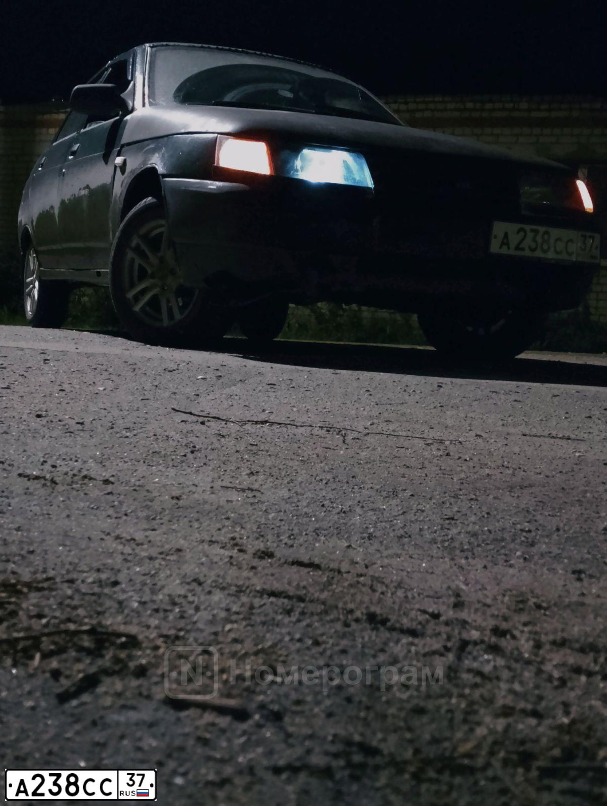 Фото автомобиля LADA 2112, 2002 — госномер А238СС37. Цвет: Темно-зеленый