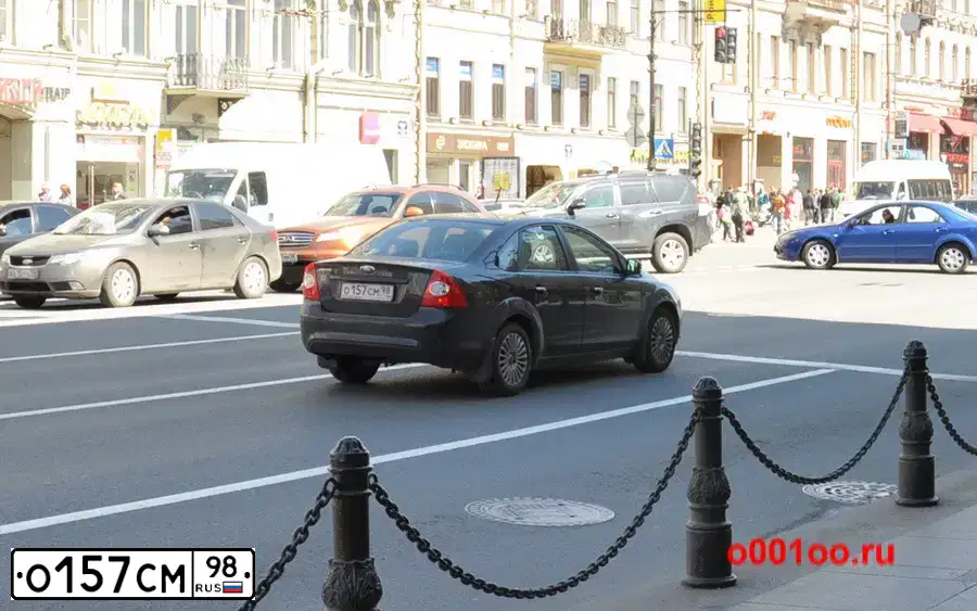 Фото автомобиля FORD FOCUS, 2010 — госномер О157СМ98. Цвет: ЧЕРНЫЙ