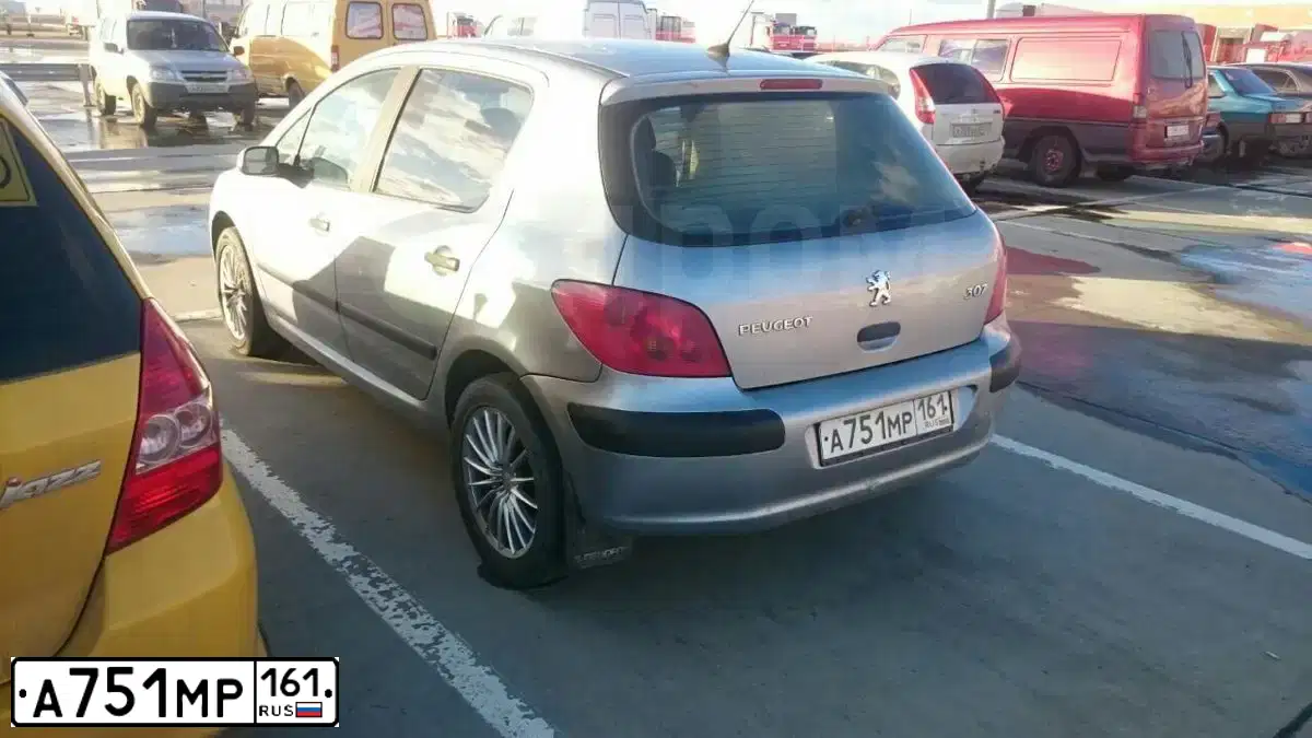 Фото автомобиля PEUGEOT 307, 2002 — госномер Х183ММ193. Цвет: Серый