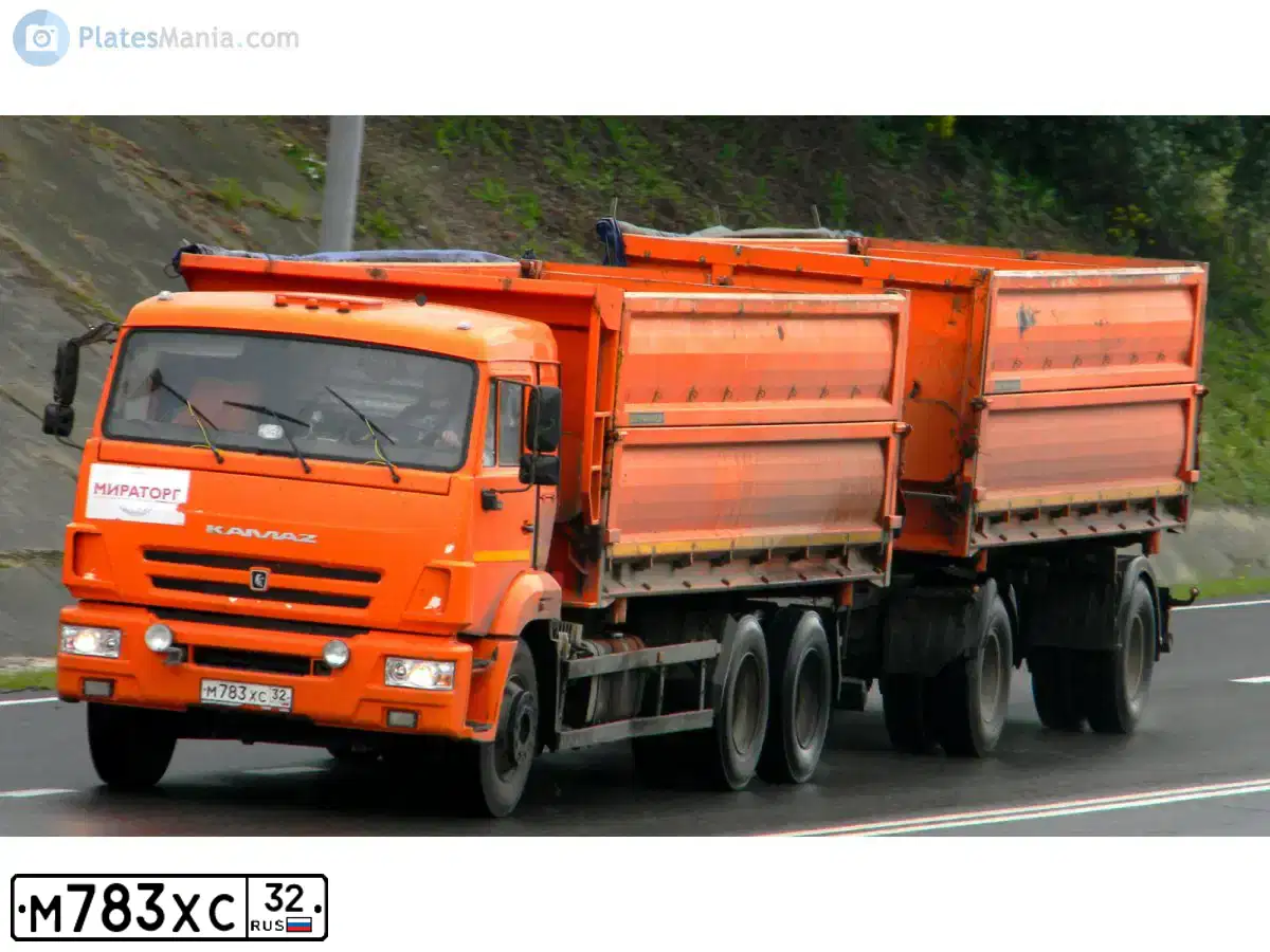 Фото автомобиля KAMAZ 65115 /6X4/, 2014 — госномер Н864ВС134. Цвет: Оранжевый
