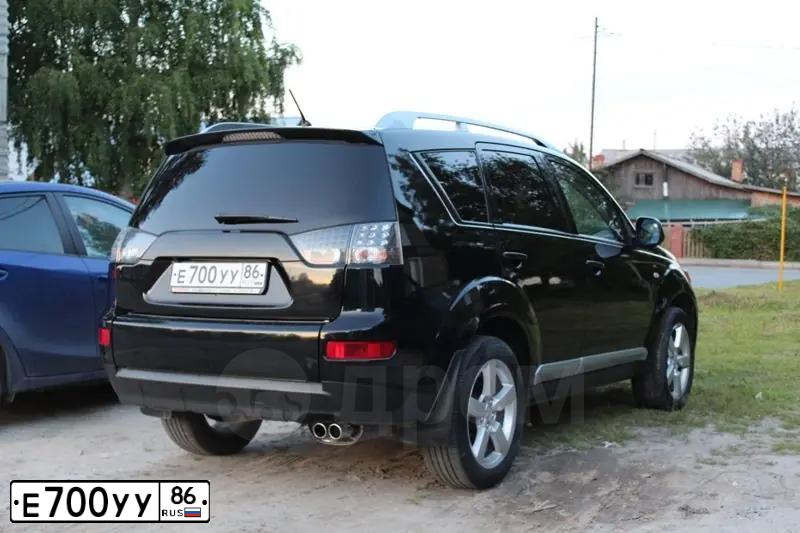 Фото автомобиля MAZDA 3, 2008 — госномер Е700УУ86. Цвет: СЕРО-ЗОЛОТИСТЫЙ