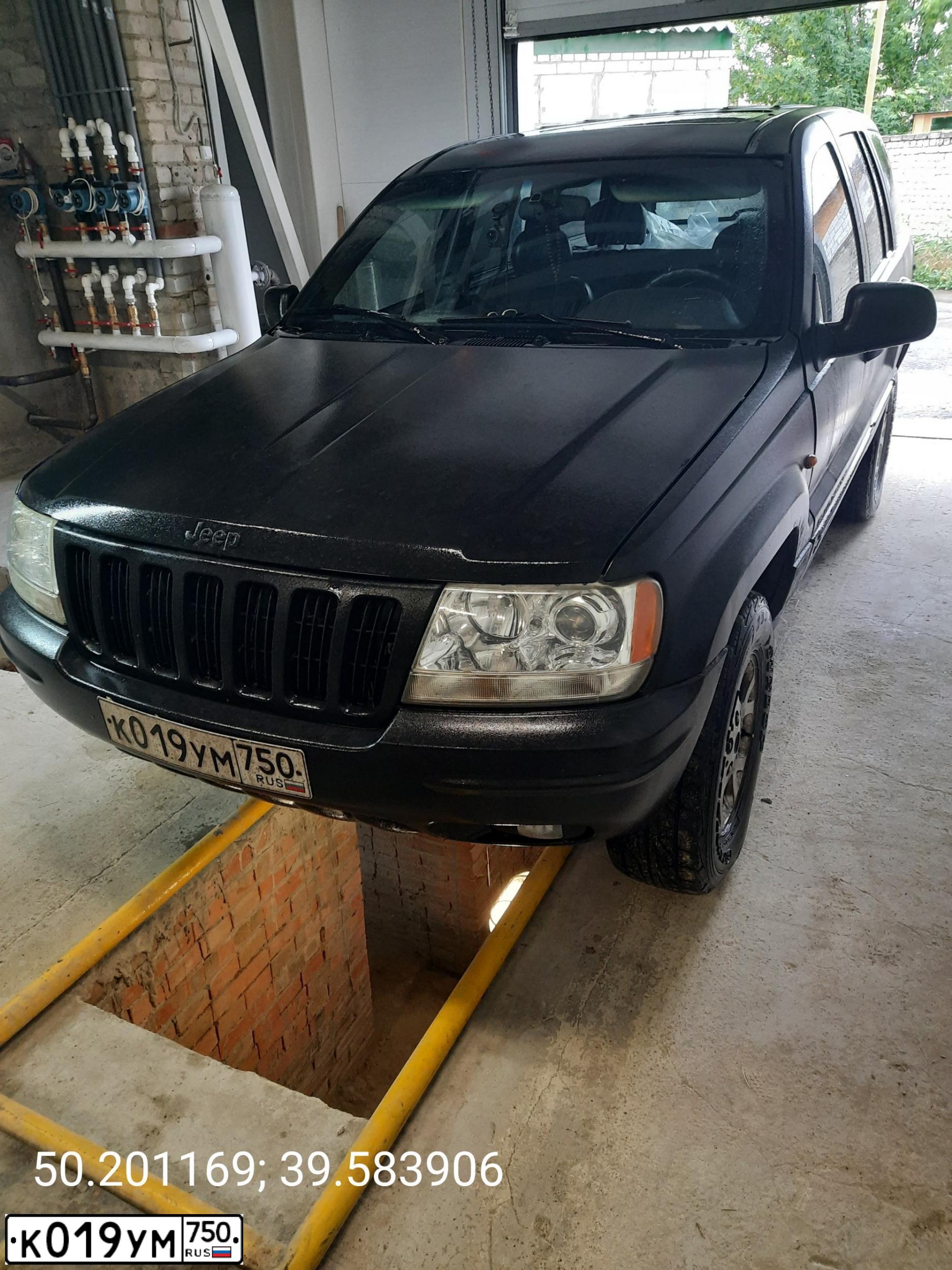 Фото автомобиля JEEP GRAND CHEROKEE, 1999 — госномер М003ЕС97. Цвет: ЧЕРНЫЙ