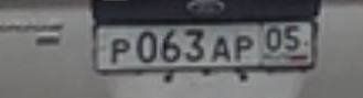 Фото автомобиля FORD FOCUS, 2005 — госномер Р063АР05. Цвет: Серебристый