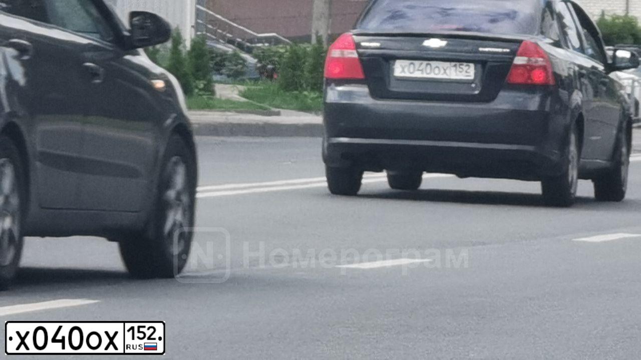 Фото автомобиля CHEVROLET AVEO, 2009 — госномер Х040ОХ152. Цвет: ЧЕРНЫЙ
