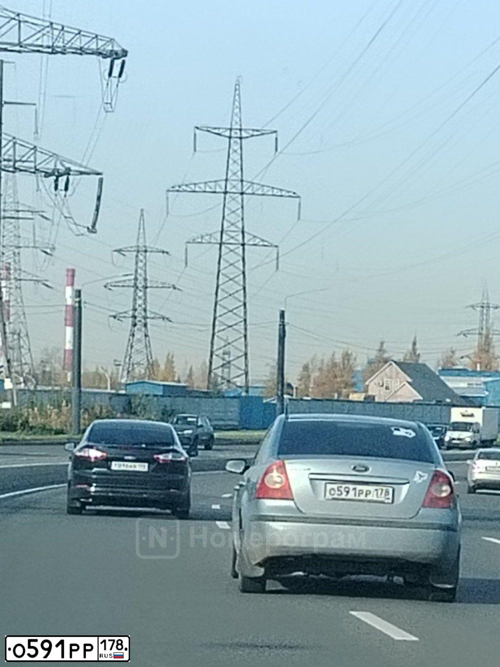 Фото автомобиля FORD FOCUS, 2006 — госномер О591РР178. Цвет: СВЕТЛО-СЕРО-ГОЛУБОЙ