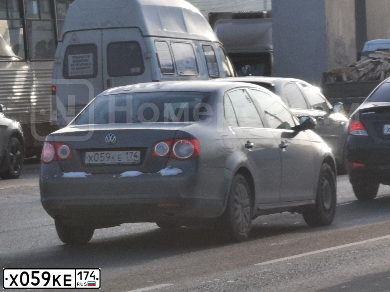 Фото автомобиля VOLKSWAGEN JETTA, 2010 — госномер Х059КЕ174. Цвет: ТЕМНО-СЕРЫЙ