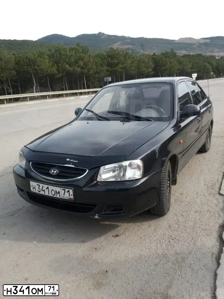 Фото автомобиля TAGAZ ACCENT, 2008 — госномер Е390УТ82. Цвет: ЧЕРНЫЙ