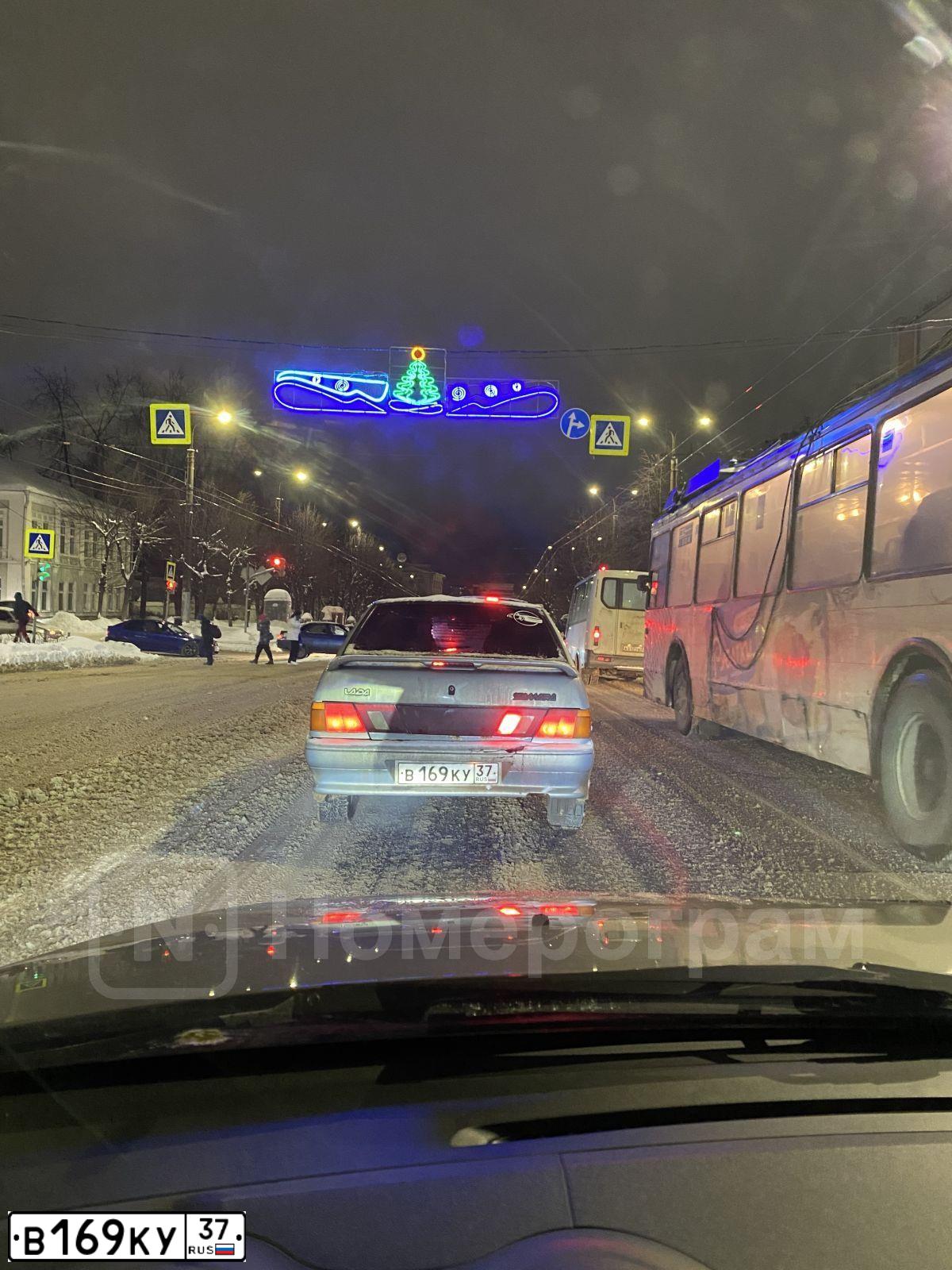 Фото автомобиля LADA 2115 SAMARA, 2007 — госномер В169КУ37. Цвет: Серебристо-желто-голубой