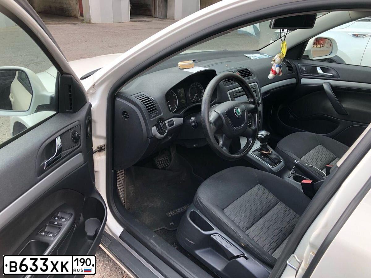 Фото автомобиля SKODA OCTAVIA, 2013 — госномер Т163РР198