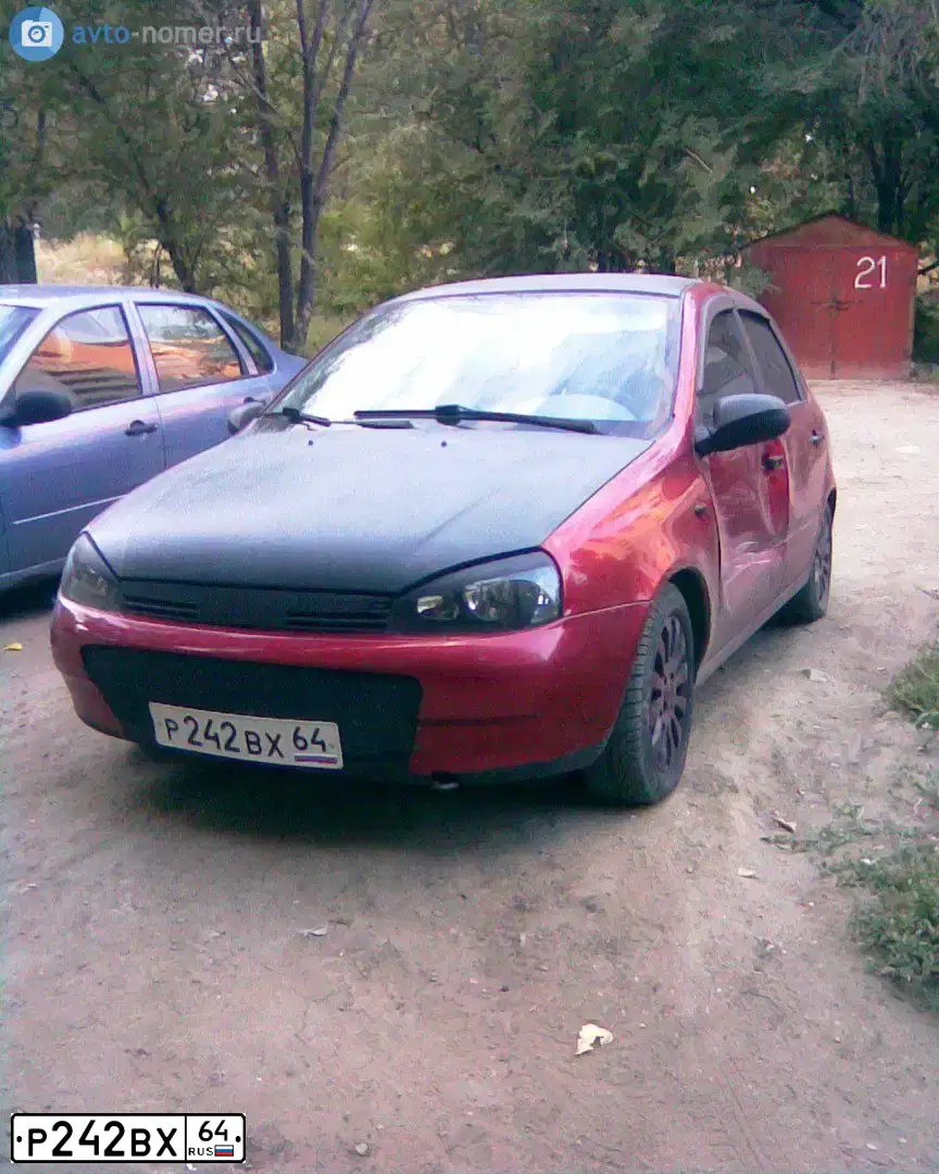 Фото автомобиля LADA 1118 KALINA, 2006 — госномер Р242ВХ64. Цвет: КРАСНЫЙ