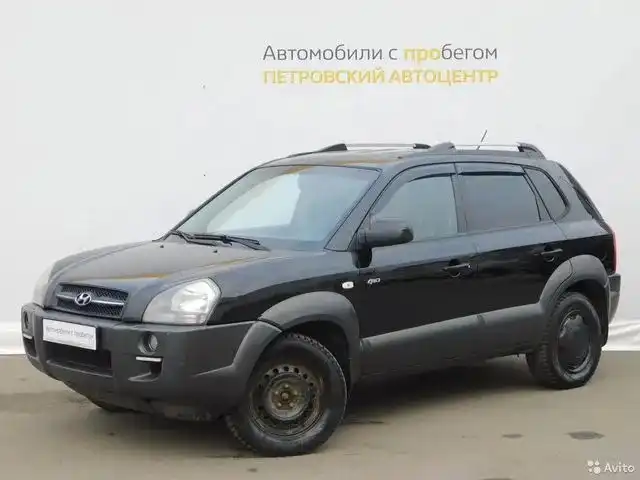 Фото автомобиля HYUNDAI TUCSON, 2005 — госномер К140ВР154. Цвет: ЧЕРНЫЙ