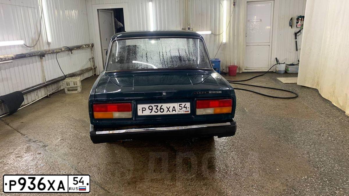Фото автомобиля LADA 2107, 2008 — госномер Р936ХА54. Цвет: ТЕМНО ЗЕЛЕНЫЙ
