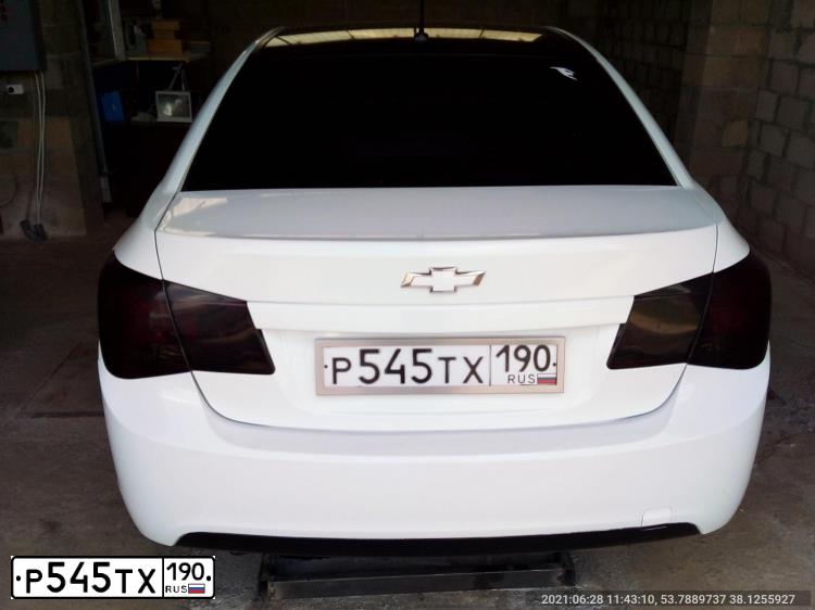 Фото автомобиля CHEVROLET CRUZE, 2010 — госномер Р545ТХ190. Цвет: БЕЛЫЙ