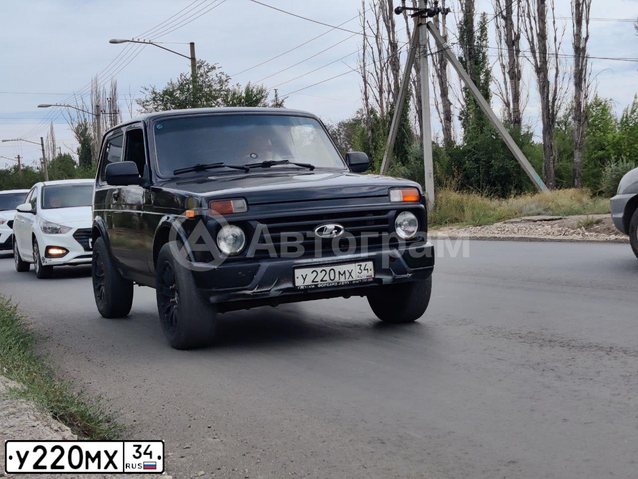 Фото автомобиля LADA 2121 NIVA, 2005 — госномер А458ОН134. Цвет: ЯРКО БЕЛЫЙ