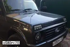 Фото автомобиля LADA 2121 NIVA, 2015 — госномер О580РС123. Цвет: Серебристо темно  серый
