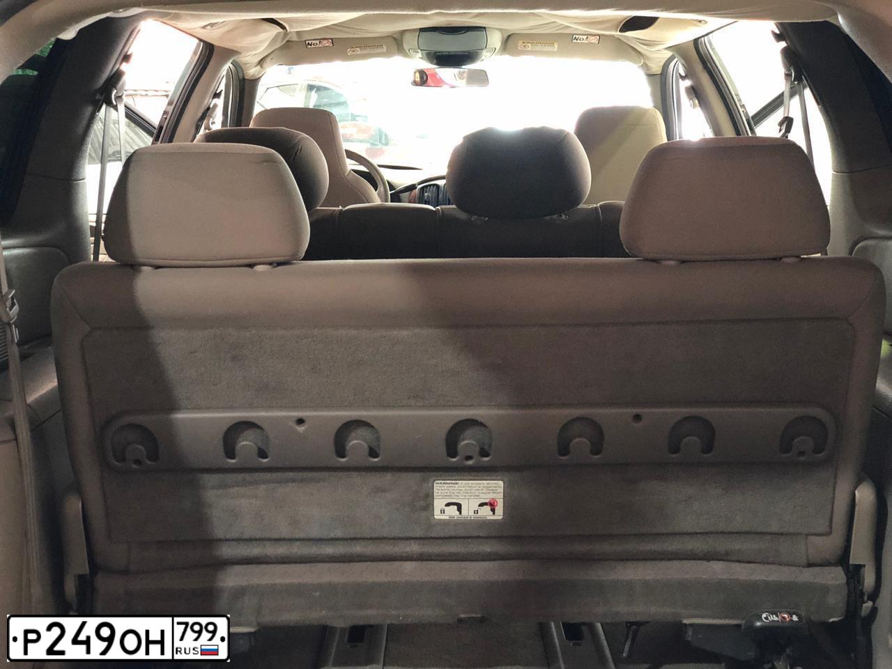 Фото автомобиля CHRYSLER TOWN &amp; COUNTRY, 2002 — госномер Р249ОН799. Цвет: Зеленый Серый