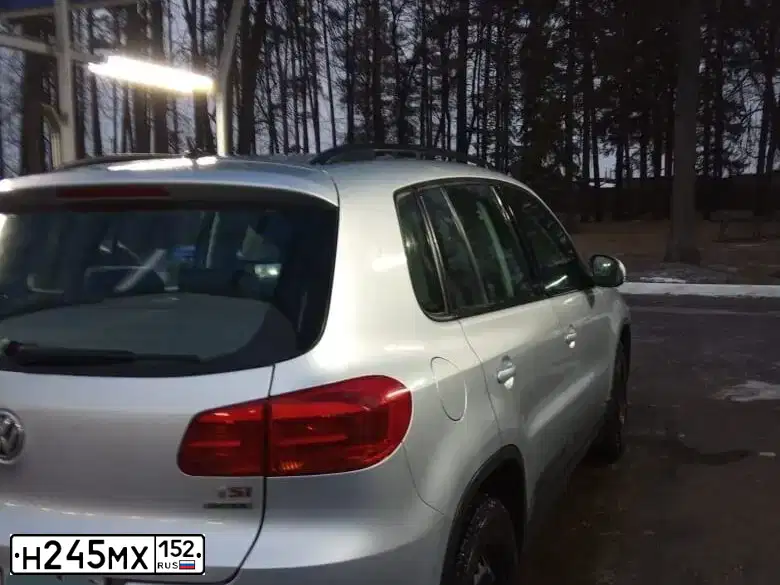 Фото автомобиля VOLKSWAGEN TIGUAN, 2014 — госномер Н245МХ152. Цвет: БЕЛЫЙ
