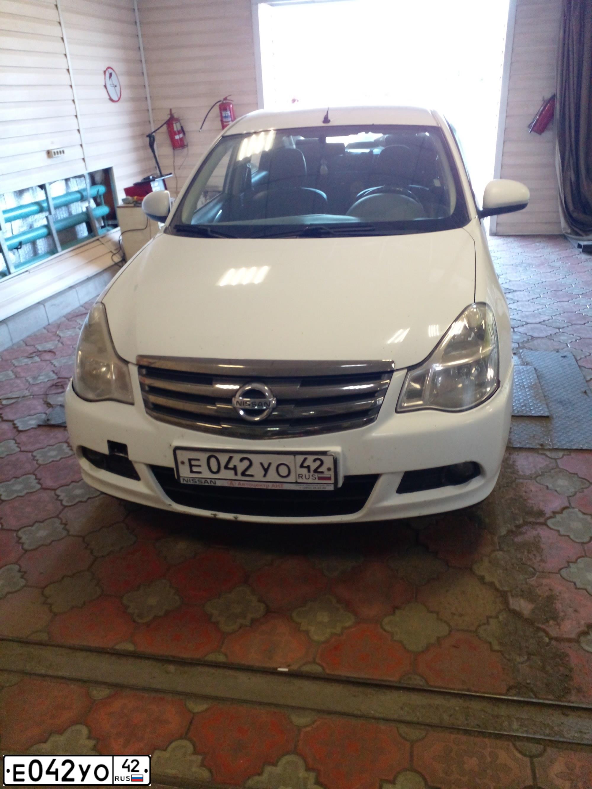 Фото автомобиля NISSAN ALMERA /AVTOVAZ/, 2014 — госномер С162ТУ154. Цвет: Белый