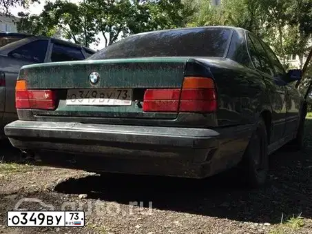 Фото автомобиля BMW SERIE 5, 1992 — госномер А535НО50. Цвет: ЗЕЛЕНЫЙ