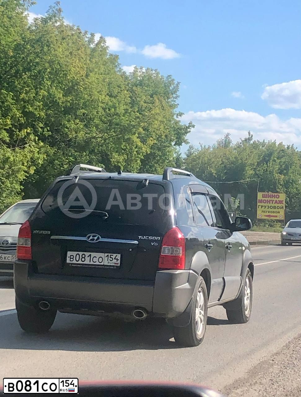 Фото автомобиля HYUNDAI TUCSON, 2007 — госномер В081СО154. Цвет: ЧЕРНЫЙ
