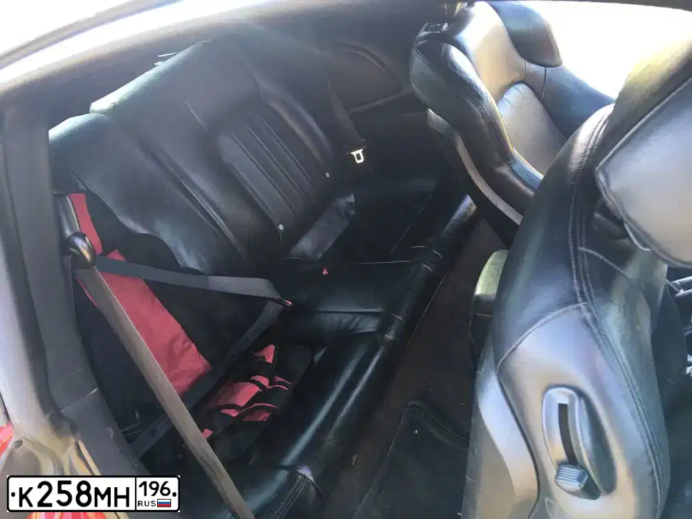 Фото автомобиля HYUNDAI TUSCANI, 2003 — госномер К377УУ134. Цвет: Красный