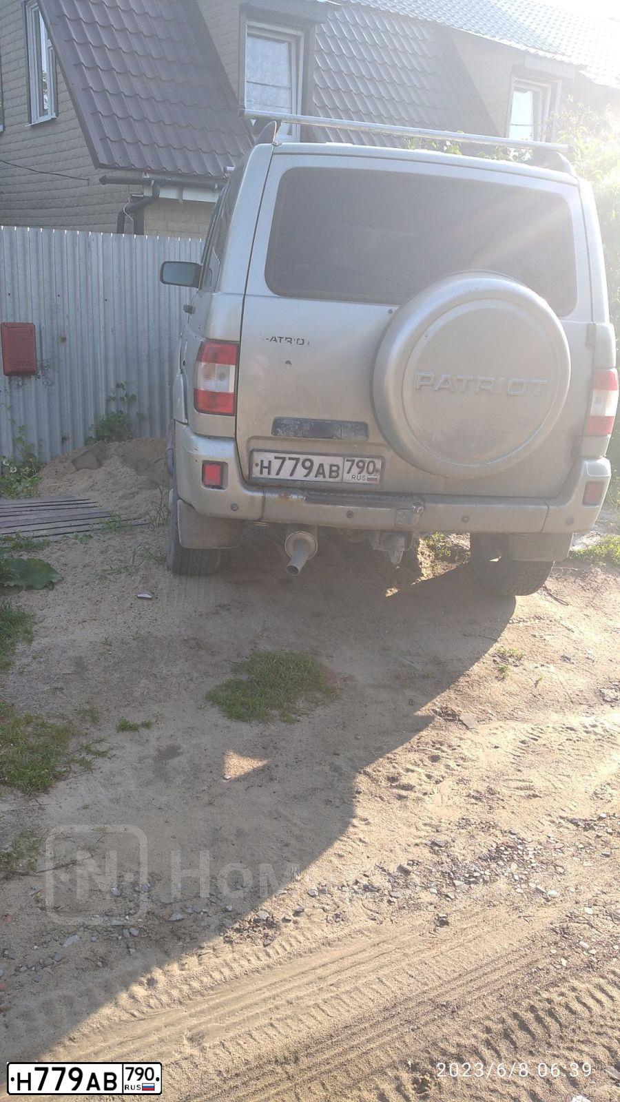 Фото автомобиля UAZ 3163 PATRIOT, 2013 — госномер Н779АВ790. Цвет: СЕРЕБРИСТО-ЖЕЛТЫЙ МЕТАЛИК