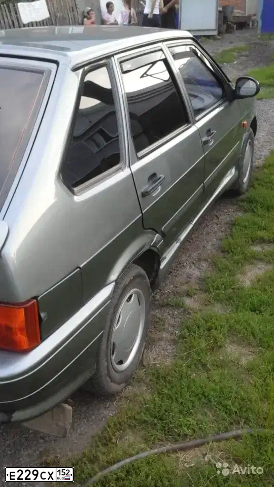 Фото автомобиля LADA 2114 SAMARA, 2011 — госномер Е229СХ152. Цвет: СЕРО-ЗЕЛЕНЫЙ