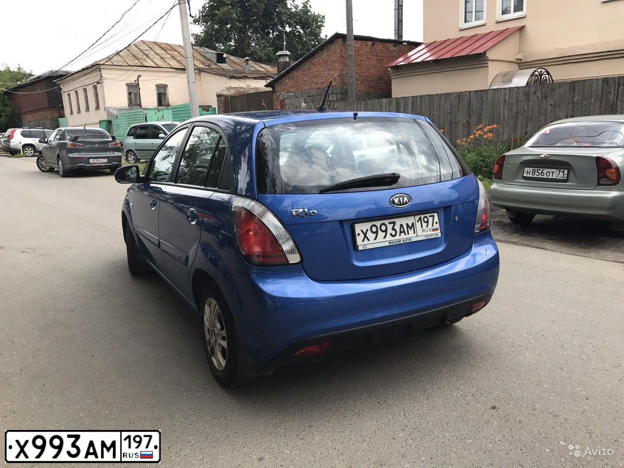 Фото автомобиля KIA RIO, 2010 — госномер О154УМ62. Цвет: синий