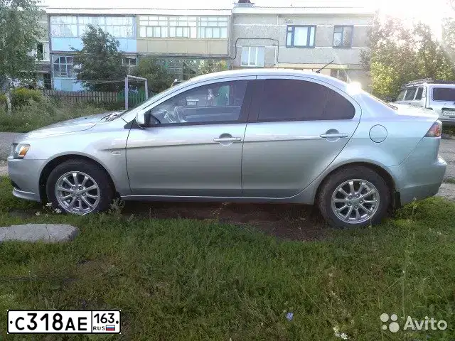Фото автомобиля MITSUBISHI LANCER, 2012 — госномер К385ТМ777. Цвет: СЕРЕБРИСТЫЙ