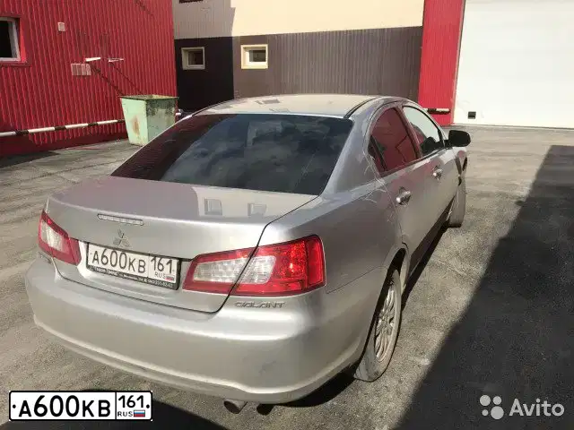 Фото автомобиля MITSUBISHI GALANT, 2008 — госномер Н584АА761. Цвет: серебристый
