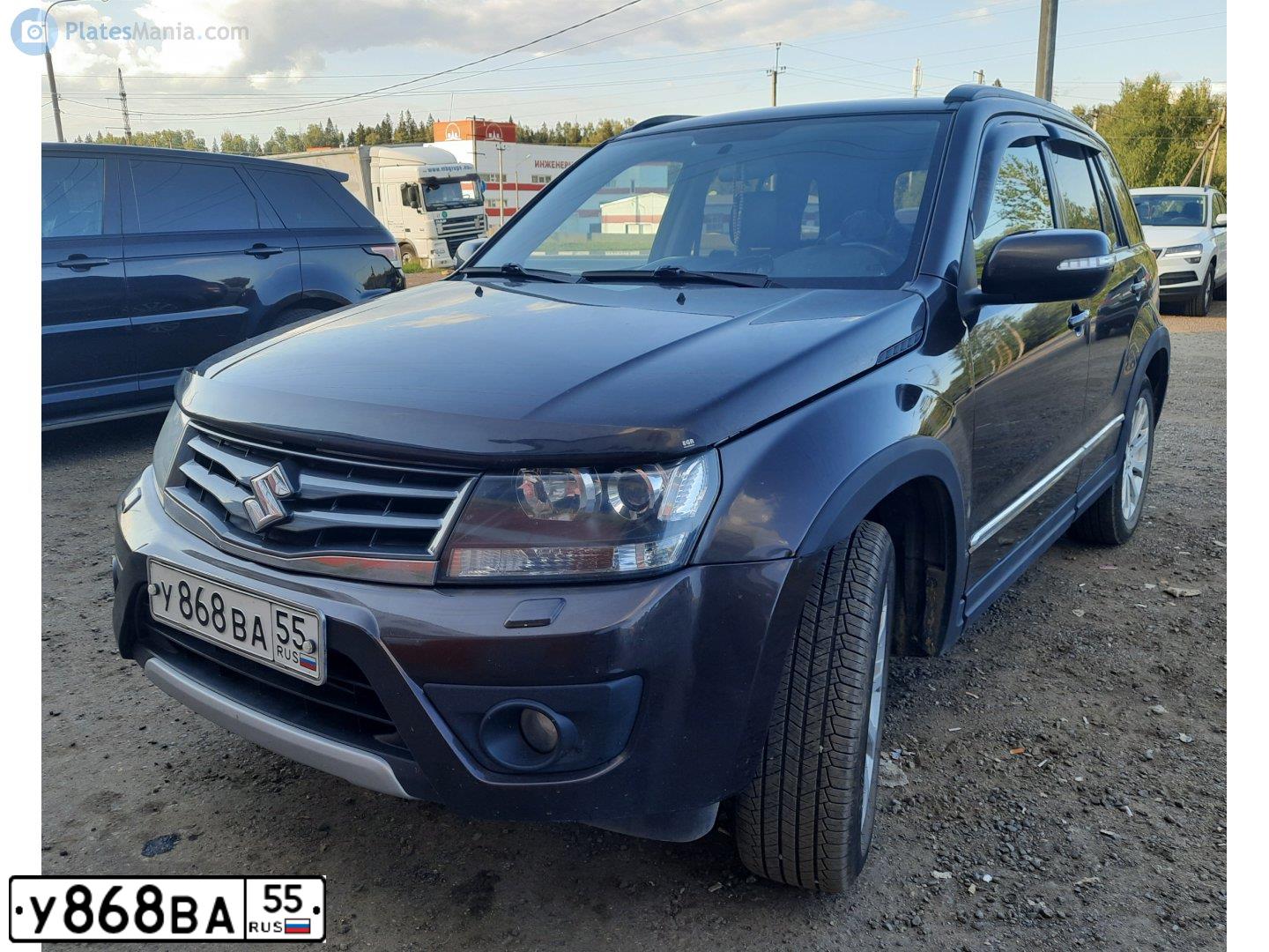 Фото автомобиля SUZUKI /GRAND/ VITARA, 2014 — госномер Е389АУ774. Цвет: Коричневый