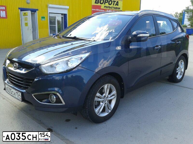 Фото автомобиля HYUNDAI IX35, 2010 — госномер А035СН154. Цвет: ТЕМНО СИНИЙ