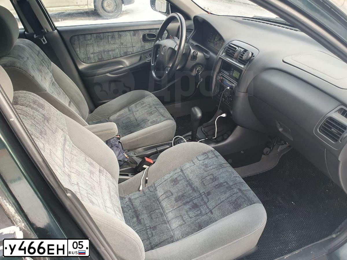 Фото автомобиля MAZDA 626, 1998 — госномер У466ЕН05. Цвет: Темно-зеленый