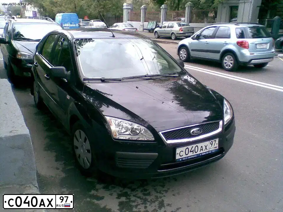 Фото автомобиля FORD FOCUS, 2006 — госномер С020СР154. Цвет: ЧЕРНЫЙ