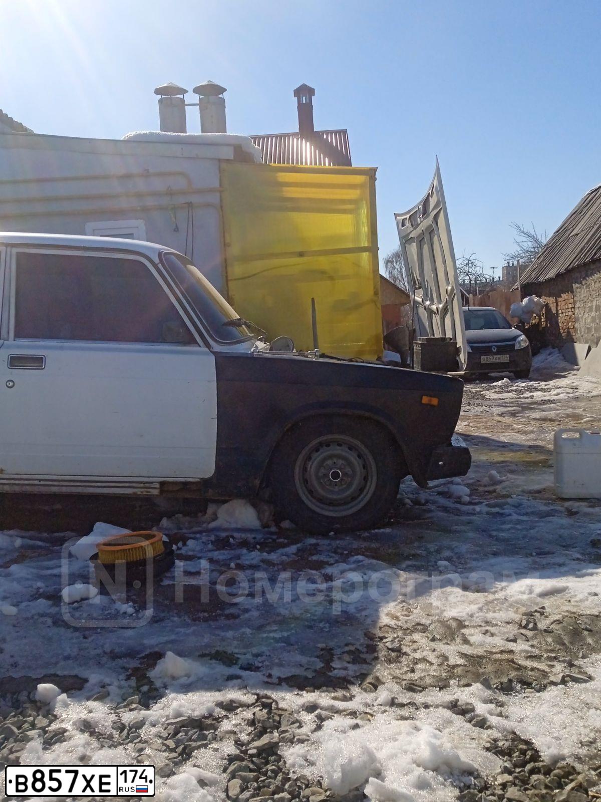 Фото автомобиля KAMAZ 65115 /6X4/, 2017 — госномер В857ХЕ174. Цвет: БЕЛЫЙ