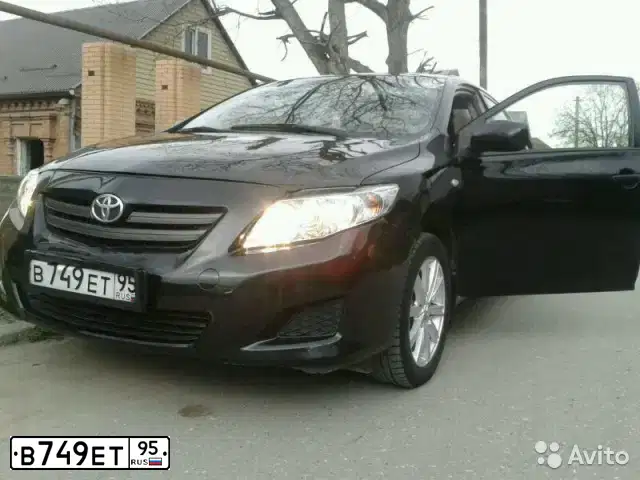 Фото автомобиля TOYOTA COROLLA, 2007 — госномер О854РС150. Цвет: ЧЕРНЫЙ